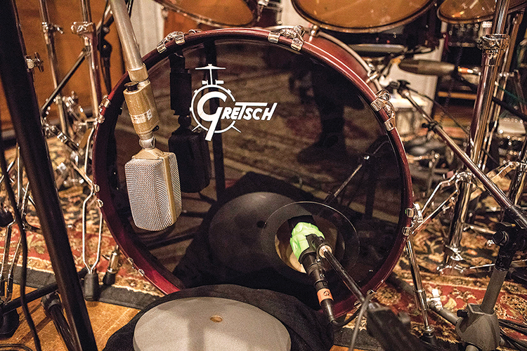 Engineer Tom Tapley used two microphones to pick up the bass drum: an AKG D 30 outside the batter head and a Sennheiser MD 421 placed through a port in the front head.