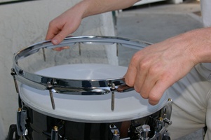 Removing tension rods of the drum